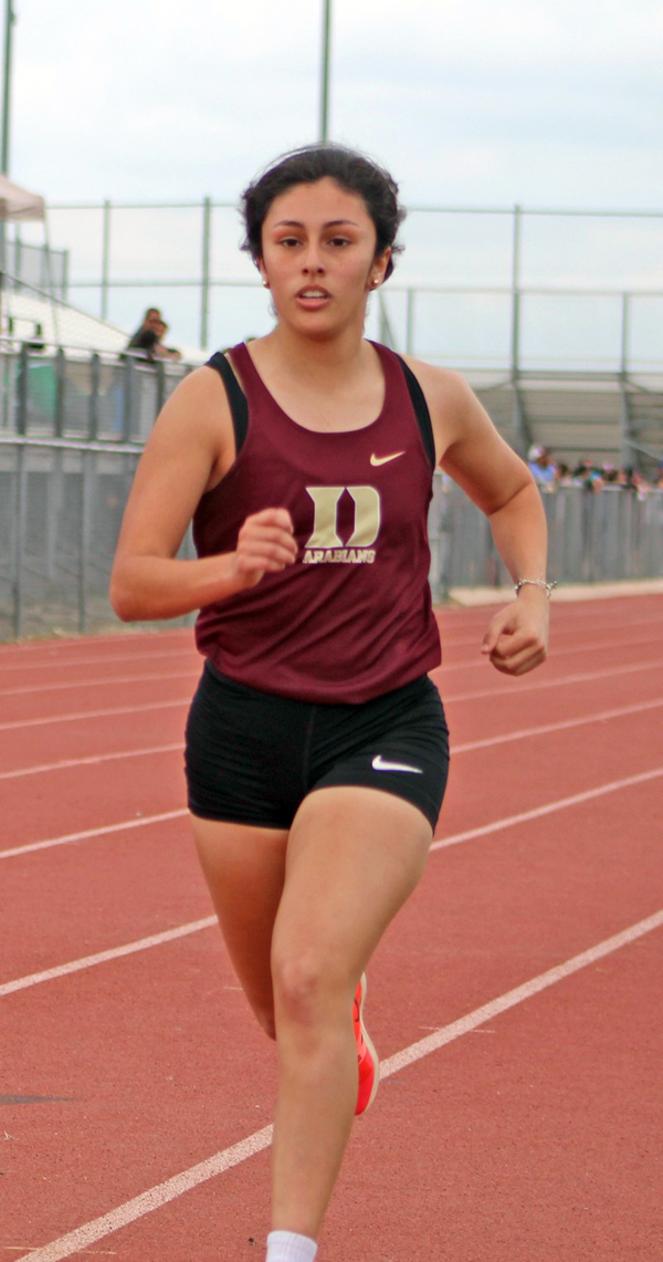 IMG_2053 Maria Murillo races in the 800 M Run COLOR – The Devine News