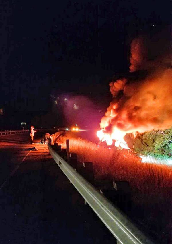 Driver escapes fiery crash