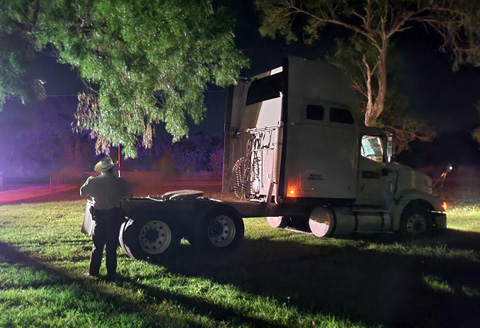18 wheeler cab pulls in driveway of home, 20 people jump and run