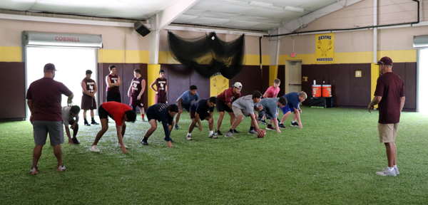 Refreshing, rainy weather welcomes Warhorses; two-a-days officially underway