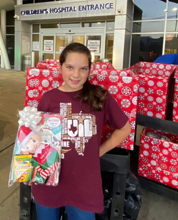December waves of kindness: Hennessey delivers 120 gifts to Children’s Hospital