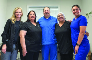 Local dentist, Dr. Justin Crocker is happy to introduce his team at Lytle Family Dentistry. From left to right they are Sonya - dental hygienist, Margo - office manager, Melinda- dental assistant, and Maykala - dental assistant. Hygienist Stephanie Morales will be joining the team this June.